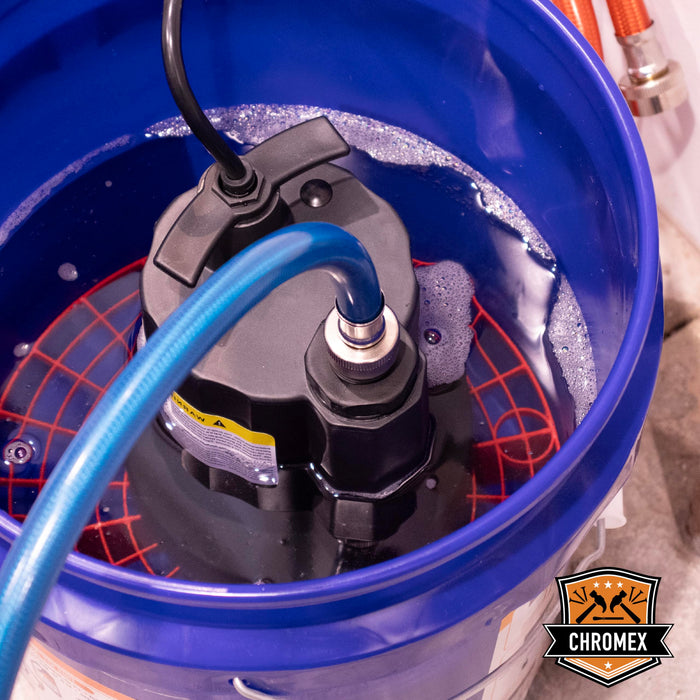 Chromex flush kit submersible pump in action inside bucket with blue hose for tankless heater descaling